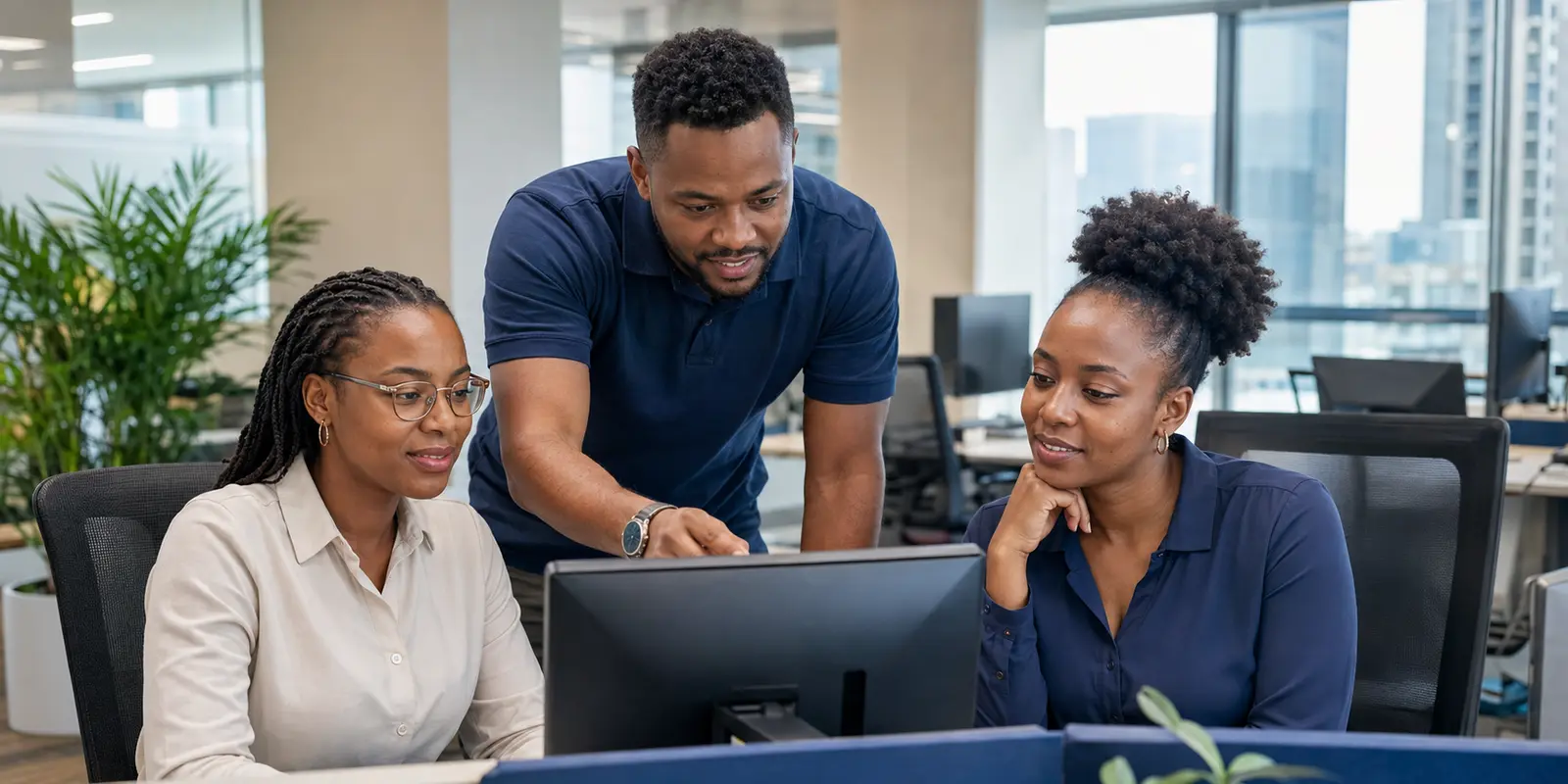 Randtech IT technician helping a South African business team
